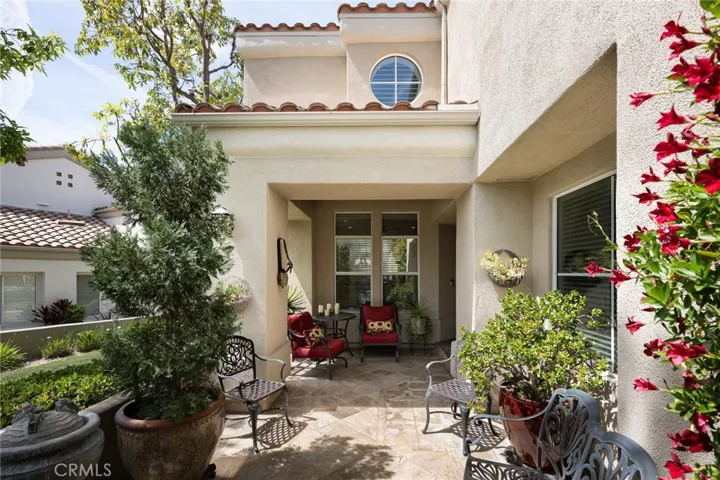 This home features a gated front courtyard.