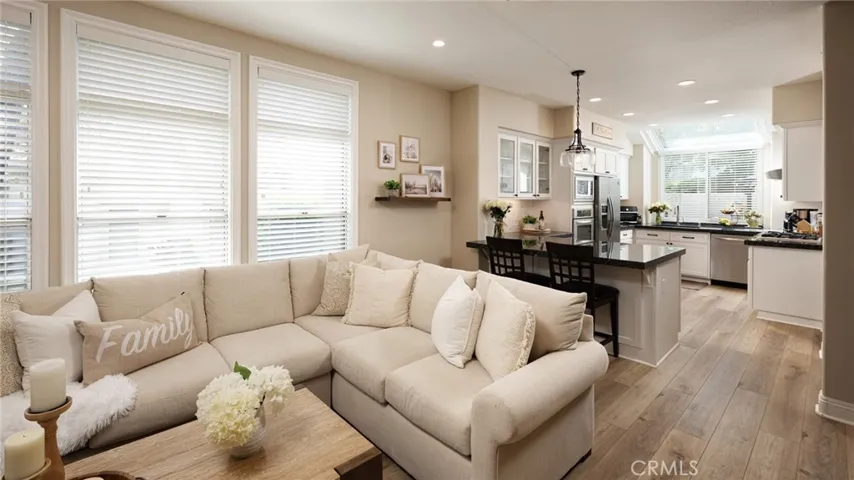 The kitchen opens to a light filled family room.
