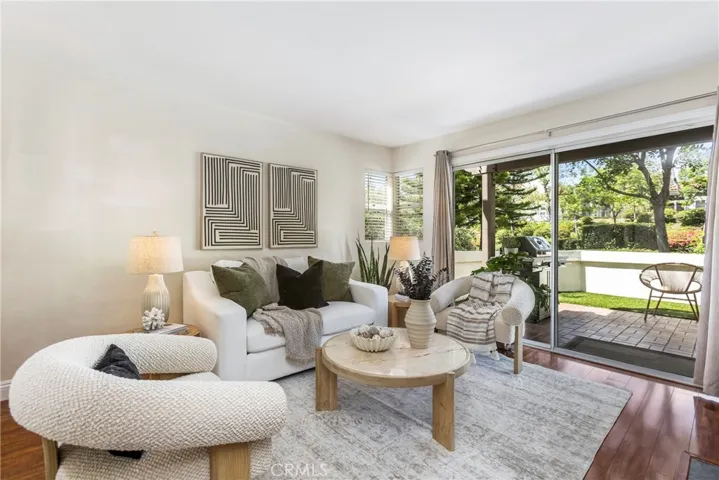 Light and bright spacious living room opens to the backyard
