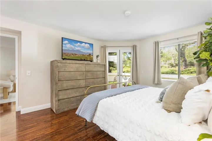 Tranquil views of the lush landscape and trees from your primary suite