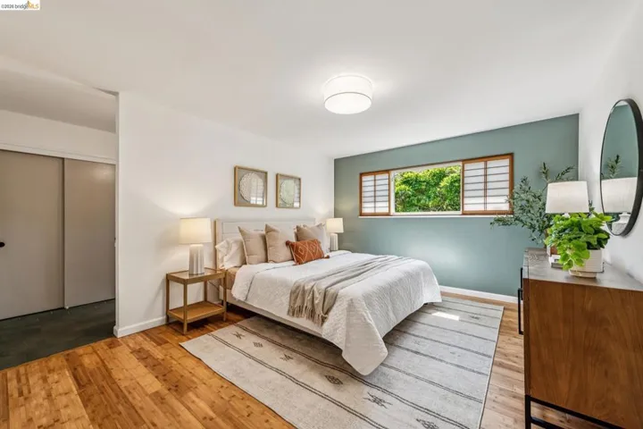 Bedroom with light wood finished floors