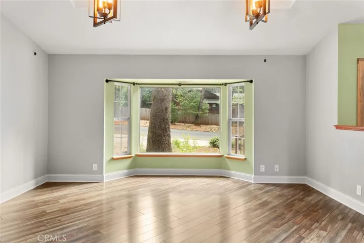 Large bay window in living room.