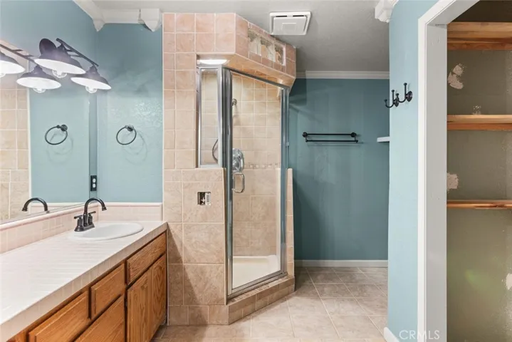 Primary bath with large walk in shower.