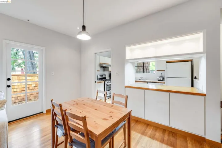 Dining area with light wood finished floors