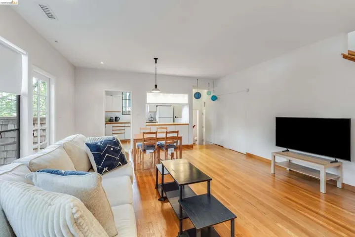 Living area featuring light wood-style flooring