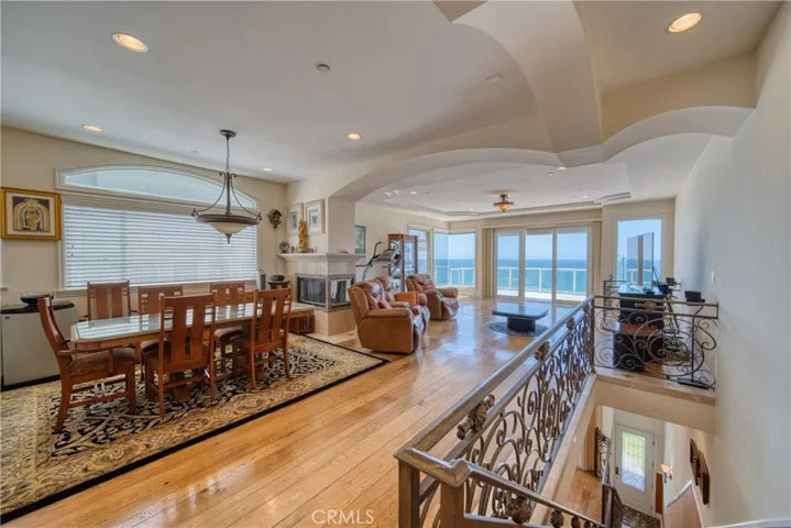 Top floor living area showing views and stairwell down to ground floor

