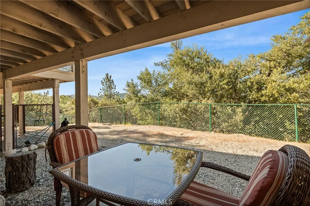 Fenced Yard Area with Small Patio