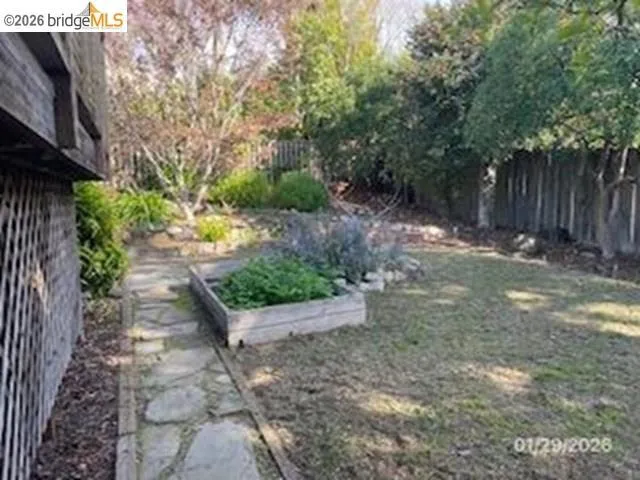 View of yard featuring a garden