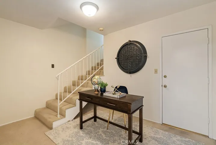 Stairs to primary and office nook