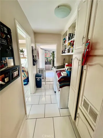 Hallway through laundry room to family room