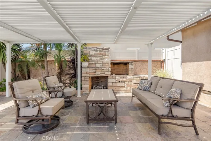 Fireplace and BBQ, seating under pergola