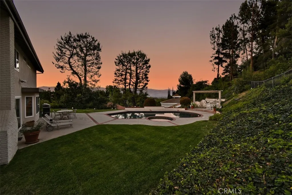 Beautiful Backyard with Pool and Spa at Twilight