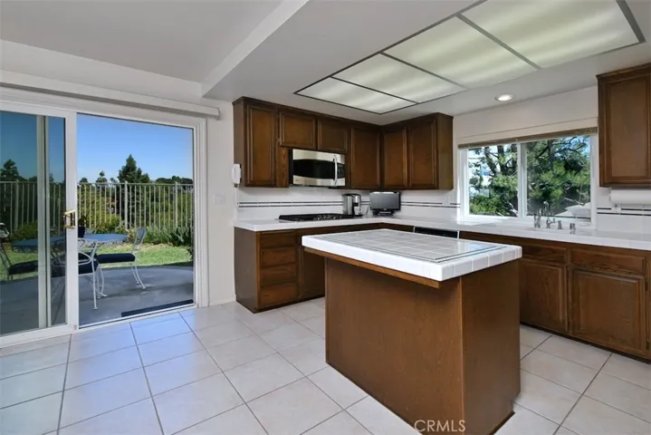 Kitchen with Island and Access to the Backyard