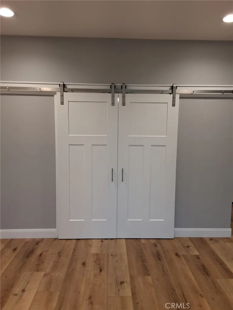 modern barn doors to bonus room