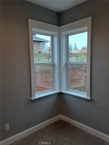 primary bedroom extended closet area or reading nook