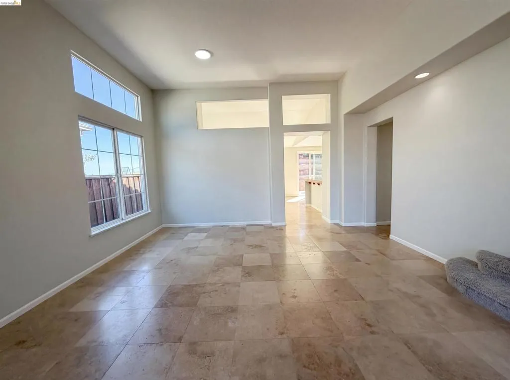 Empty room with recessed lighting