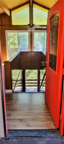 Front entry to stairs leading down to another deck