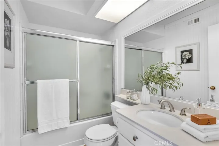 Guest bath is adjacent to secondary bedroom.