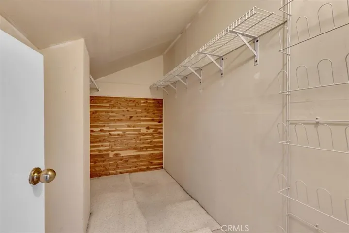 At the top of the landing is a spacious storage area perfect for seasonal items, luggage, etc.