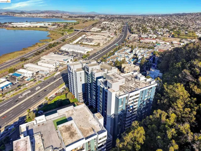 View of property location with a water and mountain view and a highway