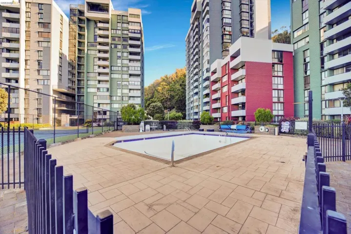 Community pool featuring a patio area