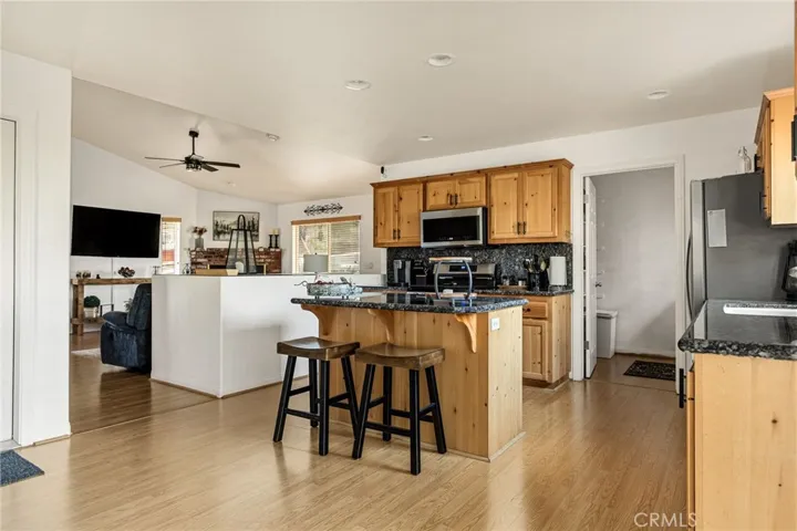 Main level kitchen/dining/living room with laundry room access from kitchen.