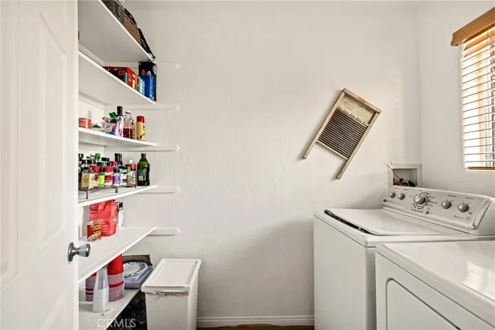 Pantry and laundry room off of kitchen.