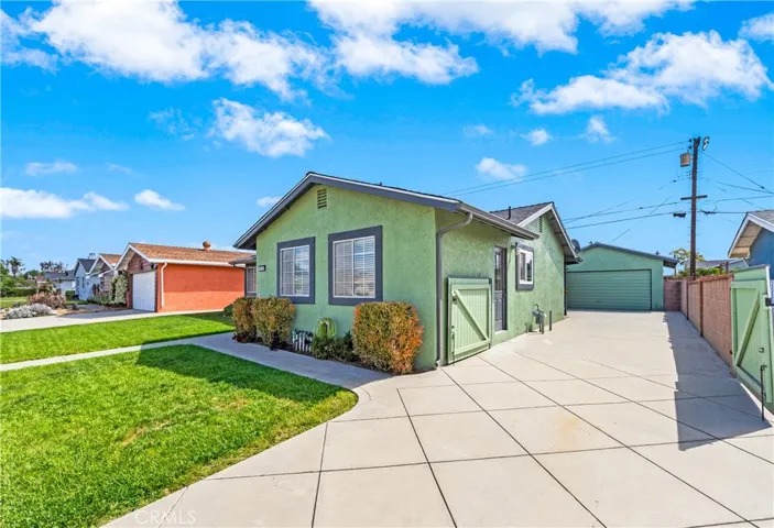 Expansive 77- foot RV driveway with gates creates a safe private play area.