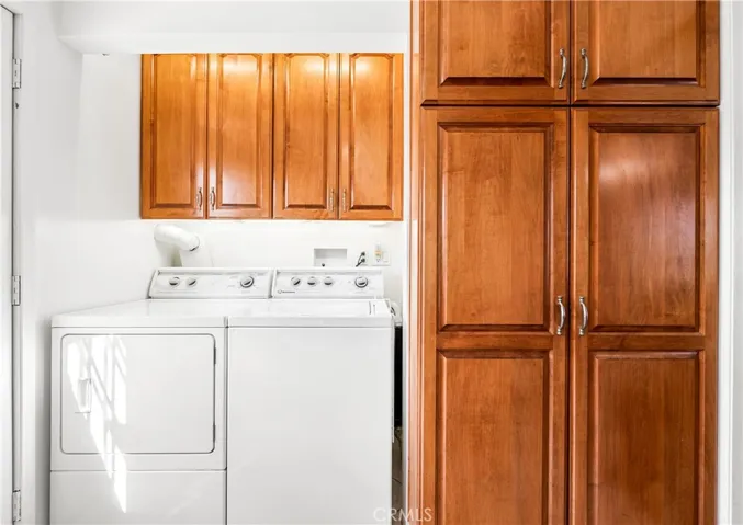 Laundry area is tucked nicely in to the kitchen