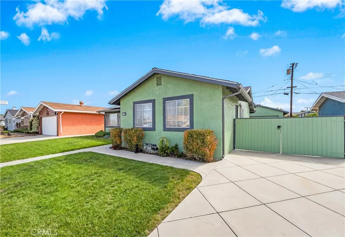 Expansive 77- foot RV driveway with gates creates a safe private play area.