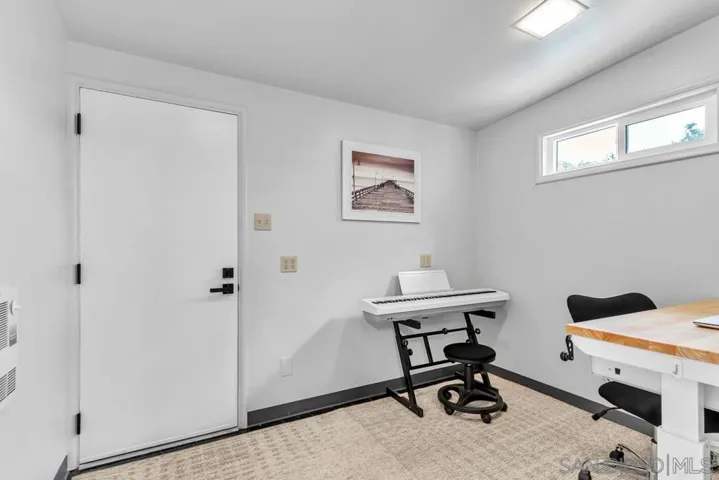 7'7" x 10' Office at rear of garage.