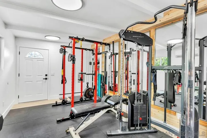 10' x 20' (Gym) Bonus Room behind TV wall in living room. Separate entrance to the backyard.