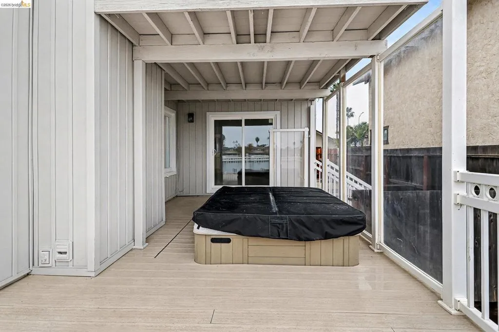 Deck off primary bedroom and spa