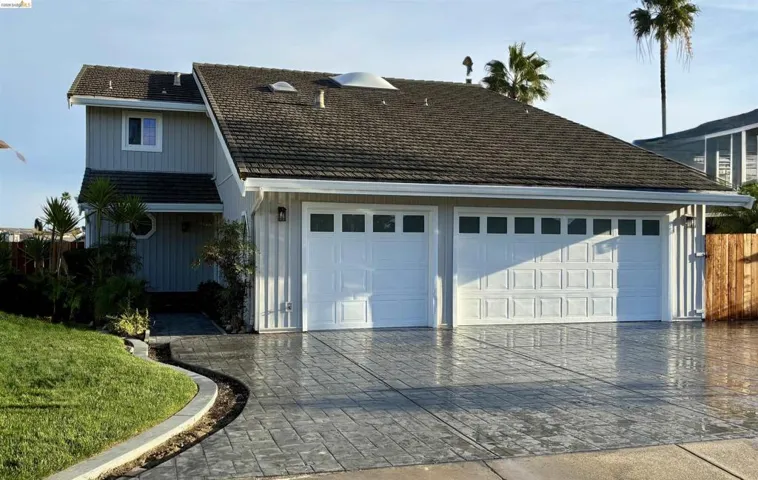Front view - Note: new stamped concrete driveway