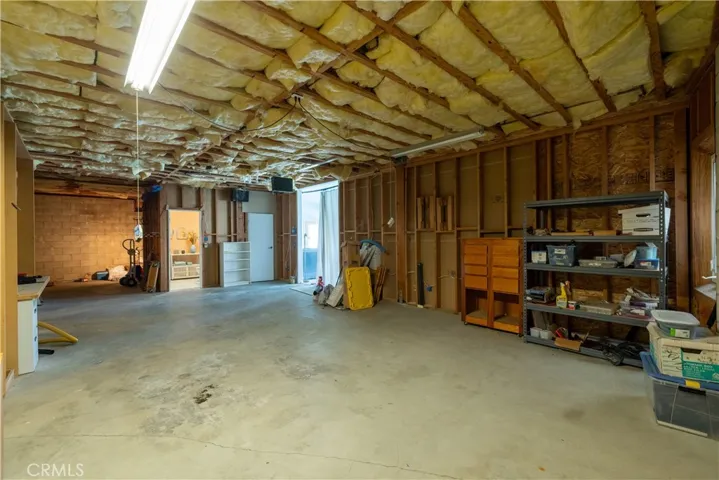 Unfinished space on lower level with separate entry. Could be used for possible ADU,workshop, recording studio, gameroom, etc. Unlimited potential for this extra space!