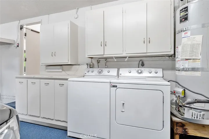 Laundry area in the garage and plenty of storage space.