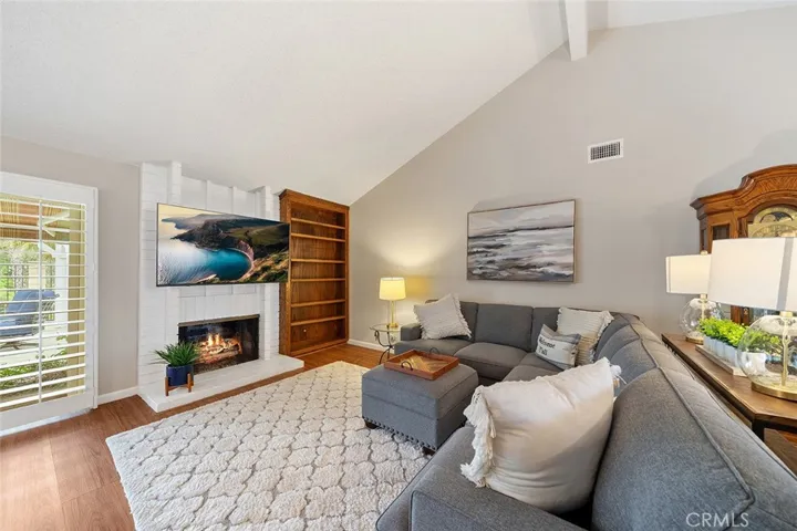 Fire is photoshopped in the fireplace. Built in shelves for your books and decor. Furniture remains making it easy for you to just move in and enjoy.