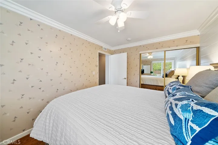 3 of 4 bedrooms. Mirrored closet doors, Crown molding and ceiling fan. Furniture to remain and enjoy.