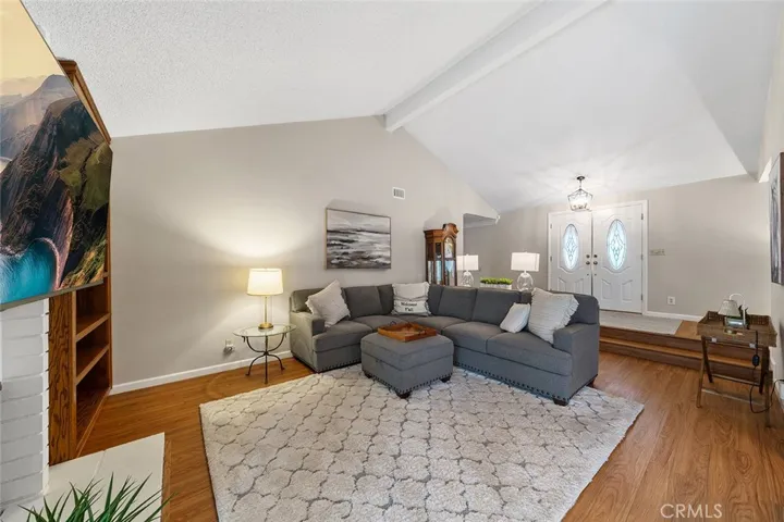 Formal living room with furniture and decor.