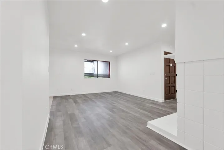 HALL AREA LOOKING INTO LIVINGROOM