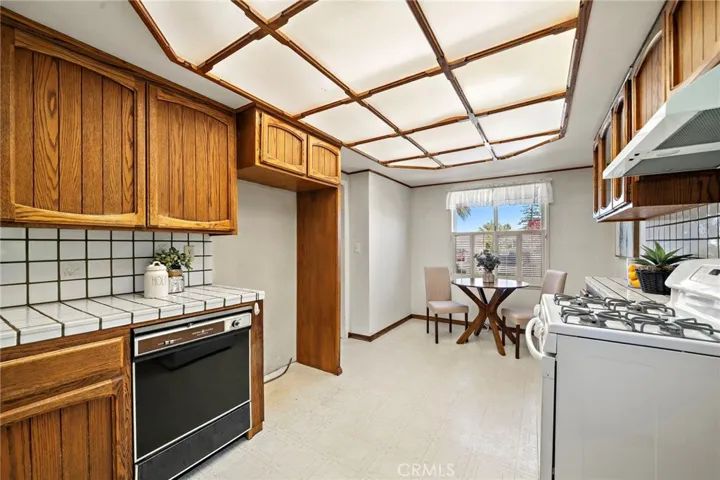 Chef's kitchen with views of the tropical backyard