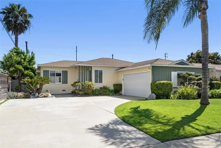 Absolutely charming 3 bedroom, 1 bath home with huge family room addition on large 7200 SF lot with access to back alley