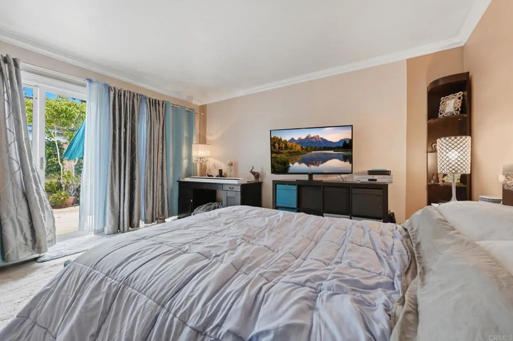 Wall hangings and personal items have been digitally removed, and TV has been digitally turned on.