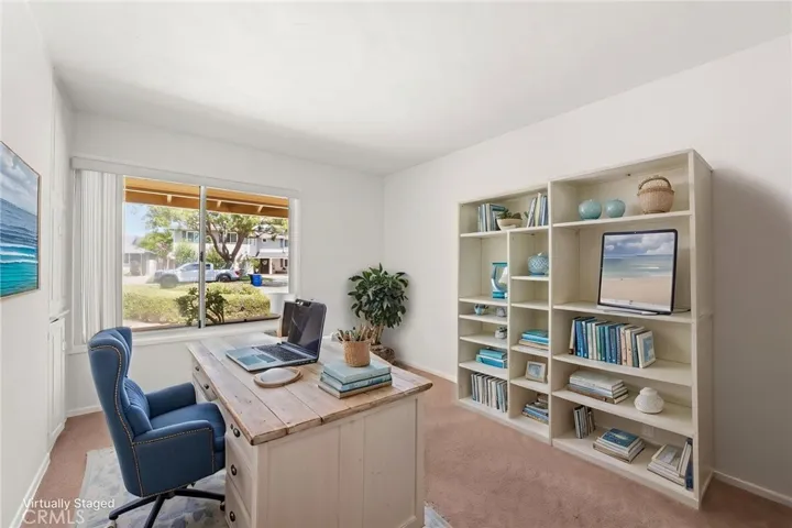 VIRITUALLY STAGED AS OFFICE.