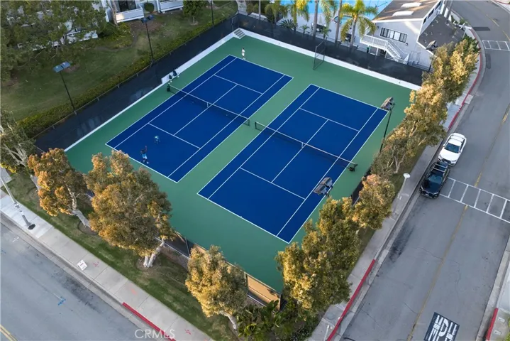Community tennis courts within the well-maintained Newport Crest community.