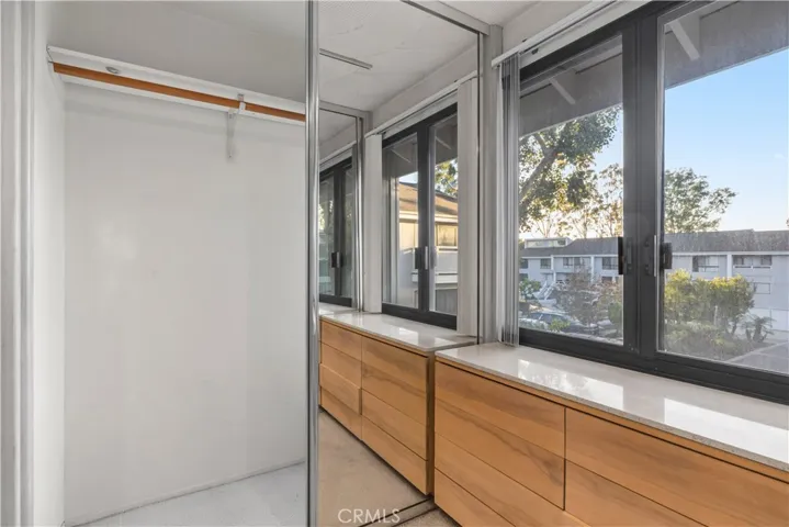 Balcony has been converted to create additional interior space in the primary bathroom.