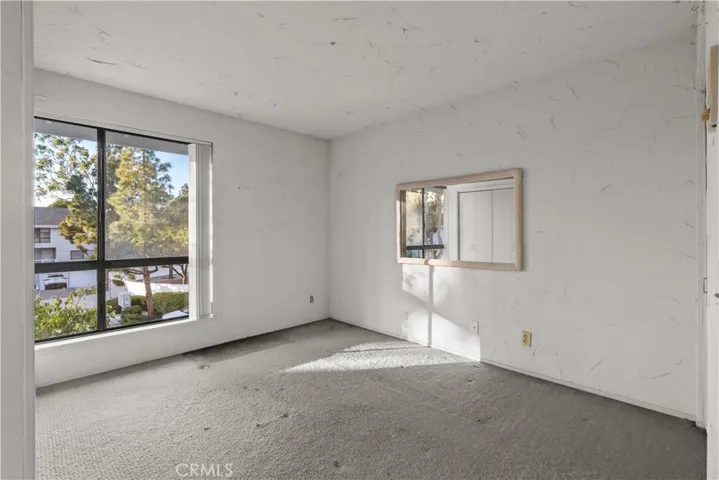 Bedroom #2 with large window and natural light