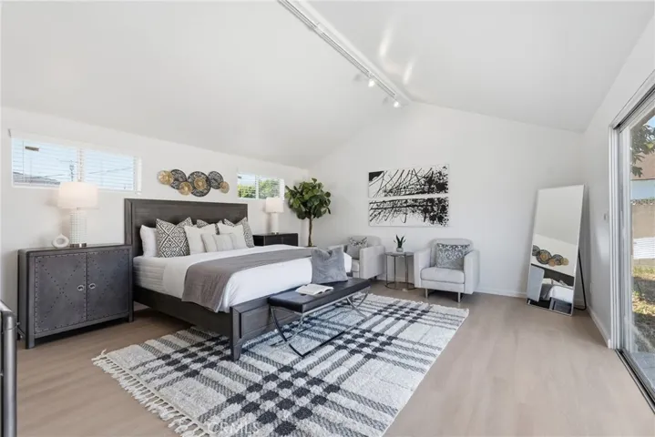 Spacious primary suite filled with abundant natural light.