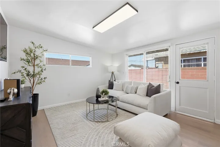 This versatile den is filled with natural light and offers convenient access to the spacious backyard.