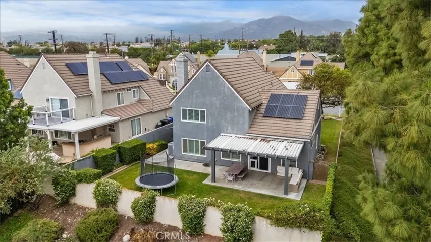 Arial view of private backyard with trampoline